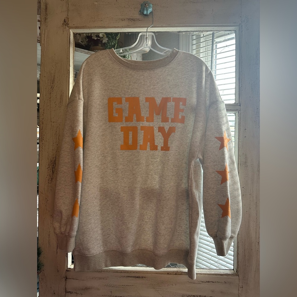 No source | Grey 'Game Day' Sweatshirt with Orange Stars